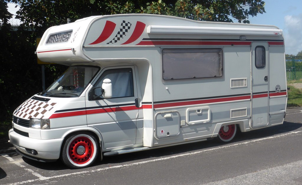 A 1997 Volkswagen T4 Compass motorhome parked in the sun